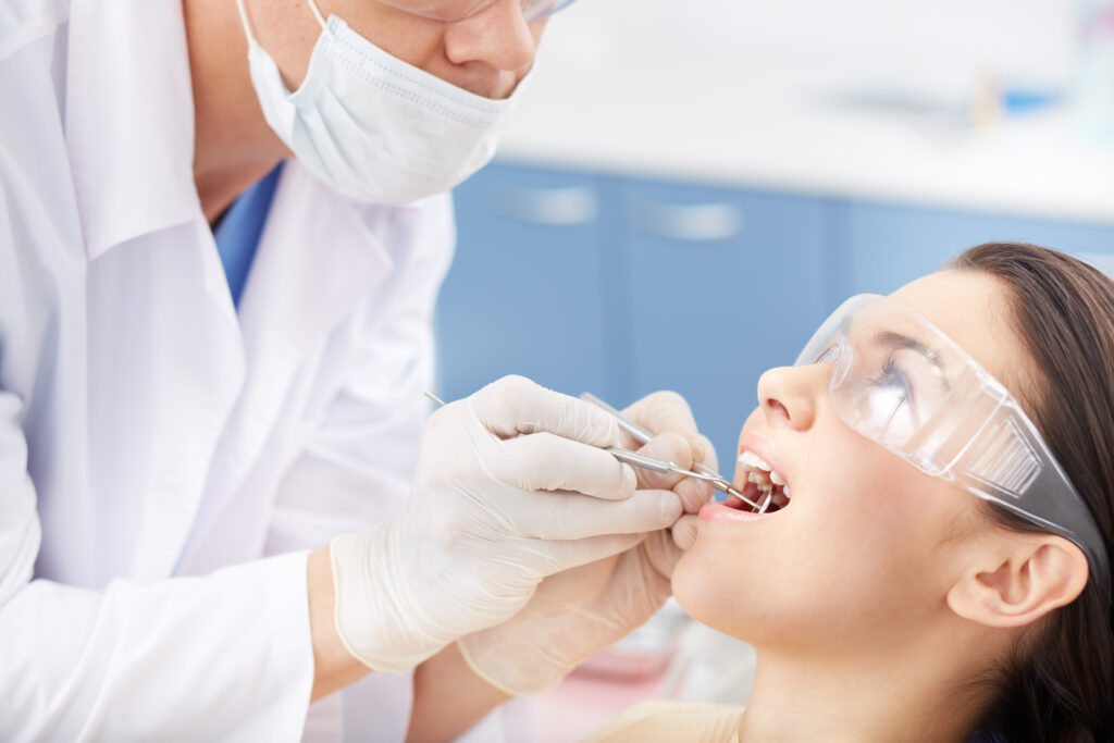 "Pain-Free Tooth Extraction – Trusted Care at Nalamm Dental Cosmetiks in Kumbakonam"